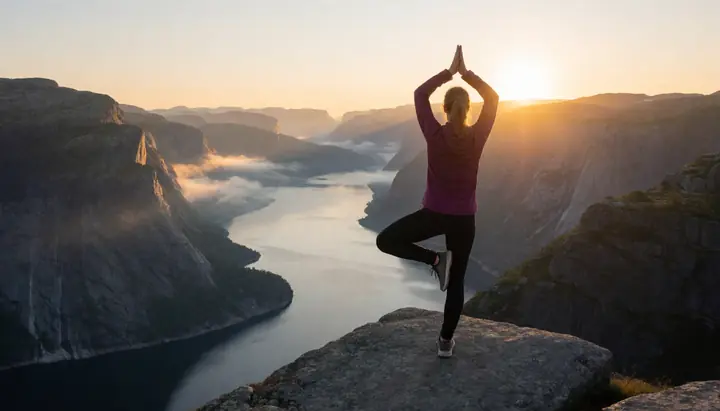 Yoga on a cliff above a fjord